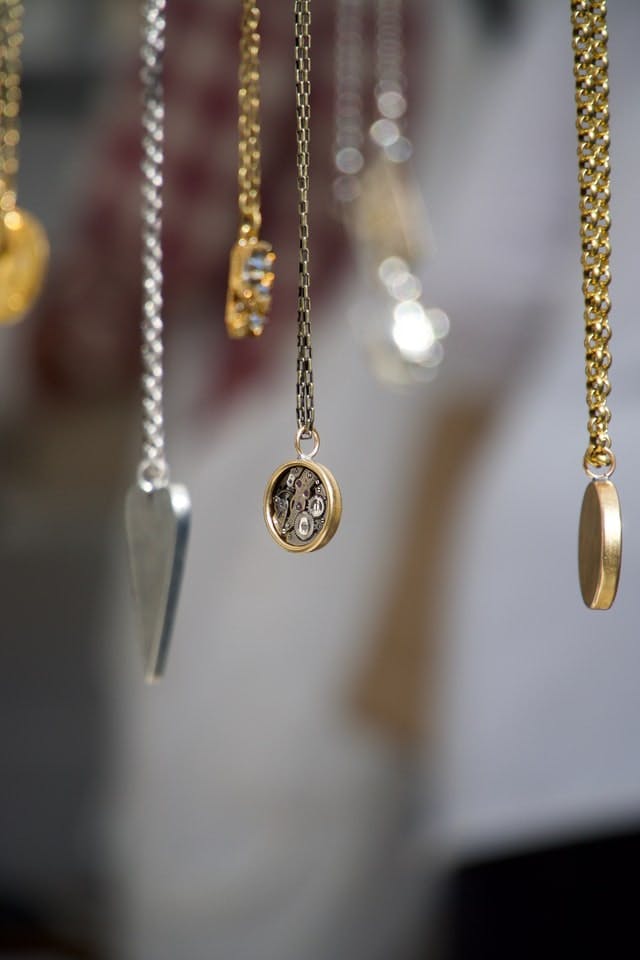 Dangling necklaces with a blurred background